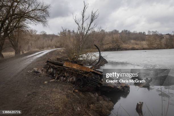 Destroyed Russian military vehicle is seen on a road on the outskirts of Trostyanets on March 30, 2022 in Trostyanets, Ukraine. Ukrainian forces...