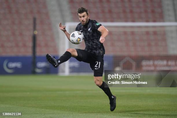 Tim Payne of New Zealand controls the ball during the 2022 FIFA World Cup Oceania Qualifier Final match between Solomon Islands and New Zealand at...