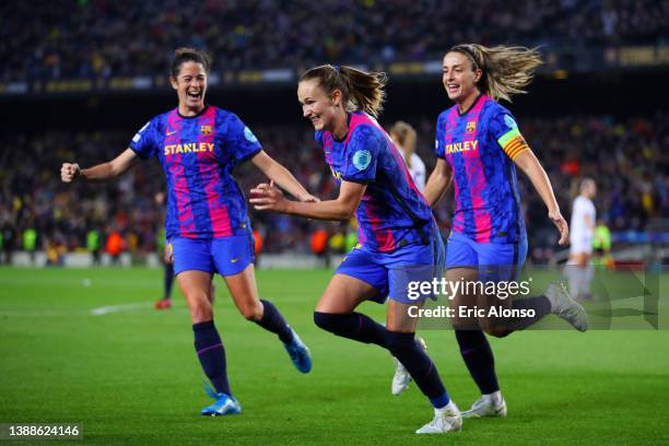 Caroline Graham Hansen of FC Barcelona celebrates with teammates Marta Torrejon and Alexia Putellas of FC Barcelona after scoring their team's fifth...