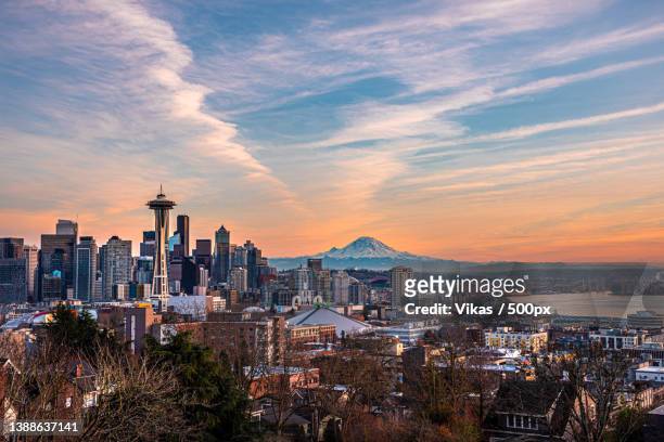 aerial view of buildings in city against sky during sunset,kerry park,united states,usa - seattle photos et images de collection