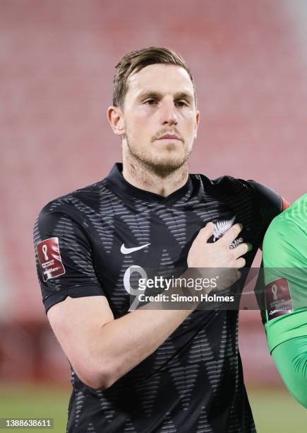 Chris Wood of New Zealand during the national anthem before the OFC World Cup qualifiers final at Grand Hamad Stadium on March 30, 2022 in Doha,...