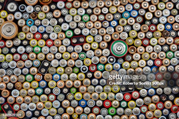 used batteries,full frame shot of bottles - alkaline stock pictures, royalty-free photos & images