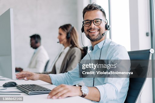 Call center workers. Call center workers.