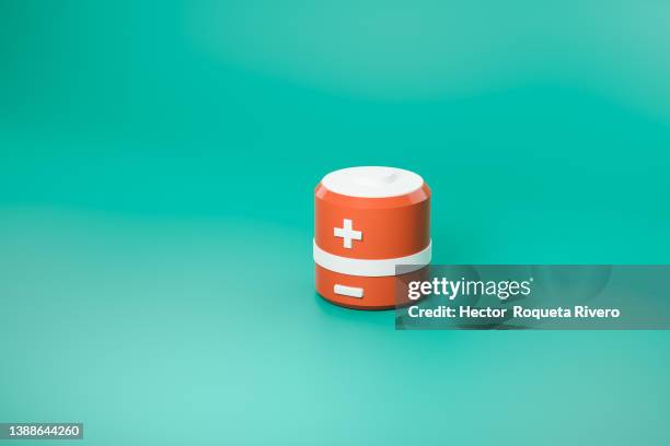 red batteries with positive and negative signs on green background, energy and climate change concept, 3d render - finance icons isolated stock-fotos und bilder