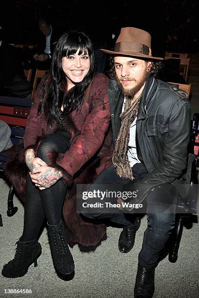 Mia Tyler and Jesse Kotansky attend Tommy Hilfiger Presents Fall 2012 Women's Collection at the Park Avenue Armory at Park Avenue Armory on February...