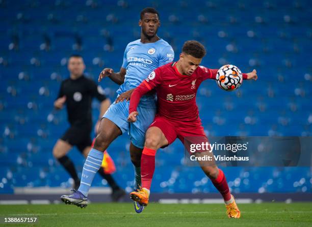 Fidel O'Rourke of Liverpool and Luke Mbete of Manchester City in action during the Premier League 2 match between Manchester City U23 and Liverpool...