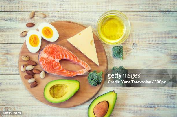 keto diet food ingredients set selective focus - paleo diet stock pictures, royalty-free photos & images