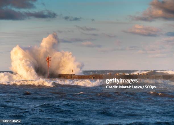 scenic view of sea against sky - storm lighthouse stockfoto's en -beelden