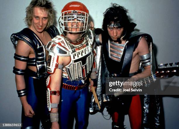 Guitarist and backing vocals Mark Gallagher, drummer Rob "Wacko" Hunter and bassist and lead vocals John Gallagher, of the English heavy metal band...