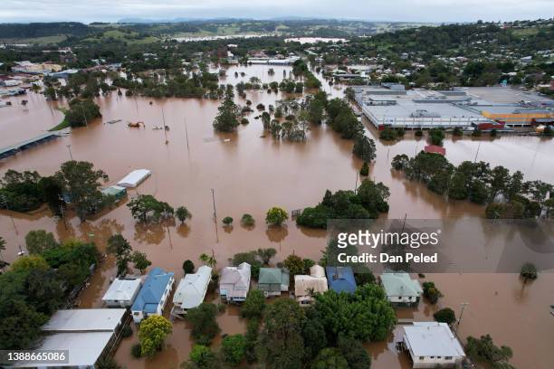 Houses are surrounded by floodwater on March 31, 2022 in Lismore, Australia. Evacuation orders have been issued for towns across the NSW Northern...