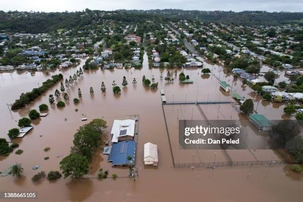 Houses are surrounded by floodwater on March 31, 2022 in Lismore, Australia. Evacuation orders have been issued for towns across the NSW Northern...