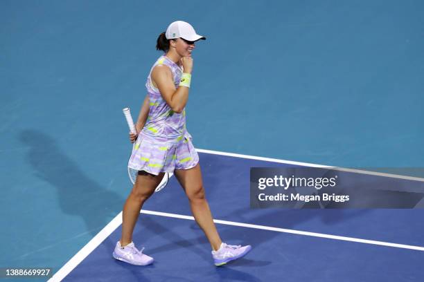 Iga Swiatek of Poland celebrates after defeating Petra Kvitova of the Czech Republic during the Women’s Singles match on Day 10 of the 2022 Miami...