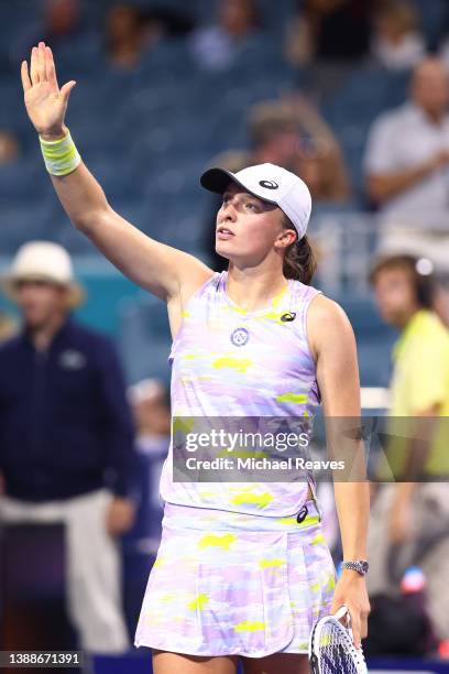 Iga Swiatek of Poland celebrates after defeating Petra Kvitova of the Czech Republic in the Women's quarterfinal match during the Miami Open at Hard...