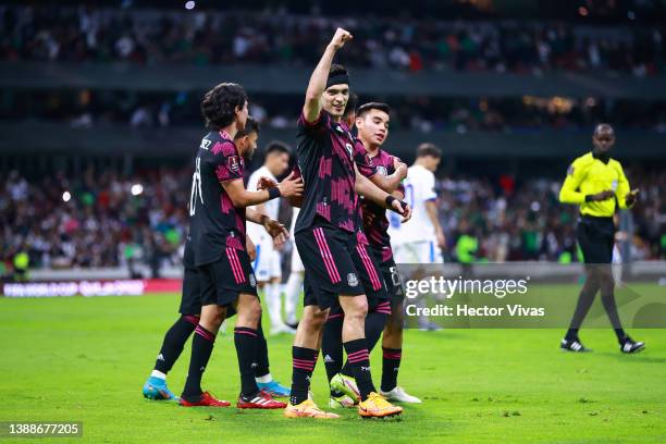 Raúl Jiménez of Mexico celebrates with teammates after scoring his team's second goal during the match between Mexico and El Salvador as part of the...