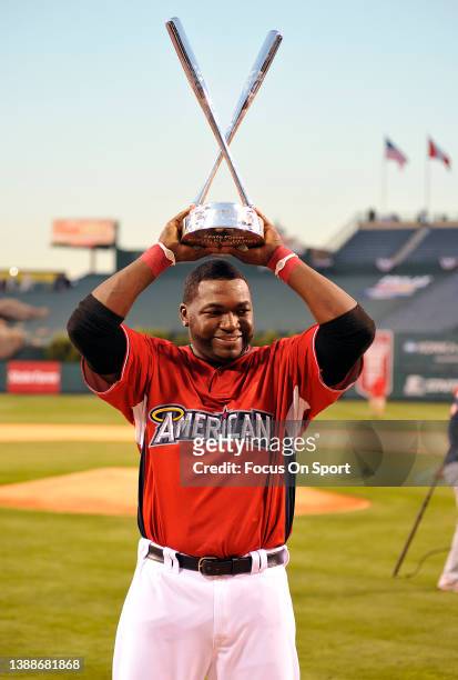 David Ortiz of the Boston Red Sox celebrates with the trophy after winning the Home Run Derby during Major League Baseball All Star break on July 13,...