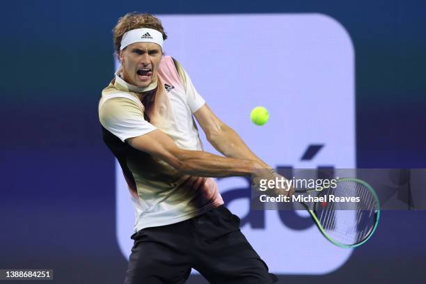 Alexander Zverev of Germany returns a shot to Casper Ruud of Norway during the Miami Open at Hard Rock Stadium on March 30, 2022 in Miami Gardens,...