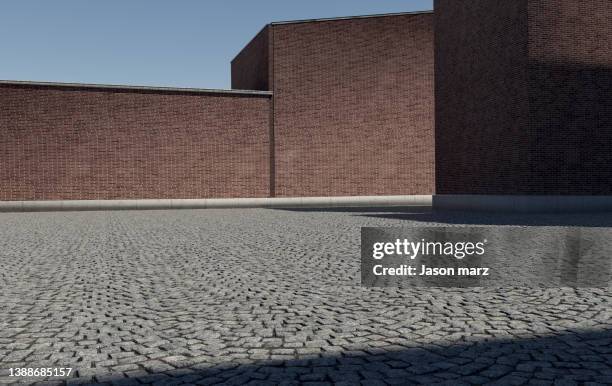 red brick warehouse - backsteinmauer stock-fotos und bilder