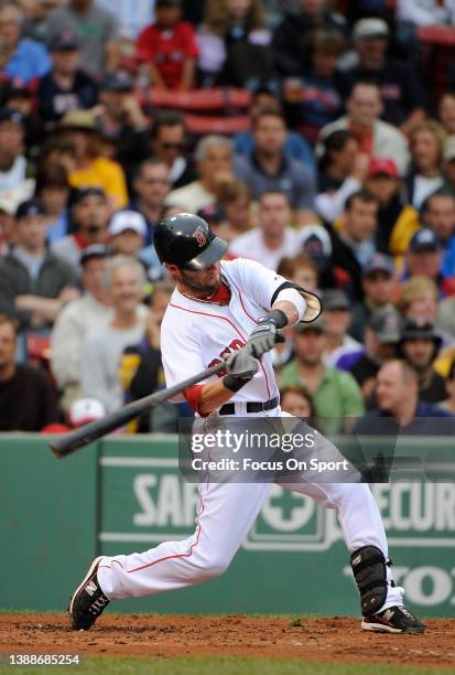 Dustin Pedroia of the Boston Red Sox bats against the Philadelphia Phillies during a Major League Baseball game on June 13, 2010 at Fenway Park in...