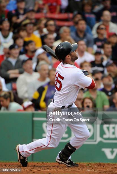 Dustin Pedroia of the Boston Red Sox bats against the Philadelphia Phillies during a Major League Baseball game on June 13, 2010 at Fenway Park in...