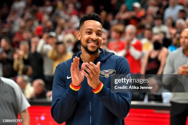 McCollum of the New Orleans Pelicans thanks the cheering crowd before the game against the Portland Trail Blazers at the Moda Center on March 30,...