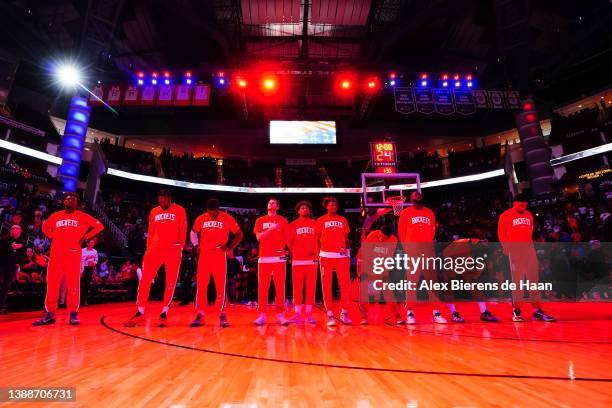 The Houston Rockets line up for the national anthem prior to the game against the Sacramento Kings at Toyota Center on March 30, 2022 in Houston,...