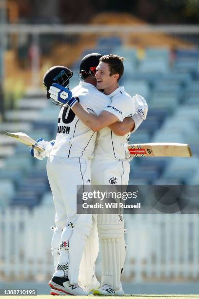 Cameron Bancroft of Western Australia celebrates his century with team mate Shaun Marsh during day one of the Sheffield Shield Final match between...