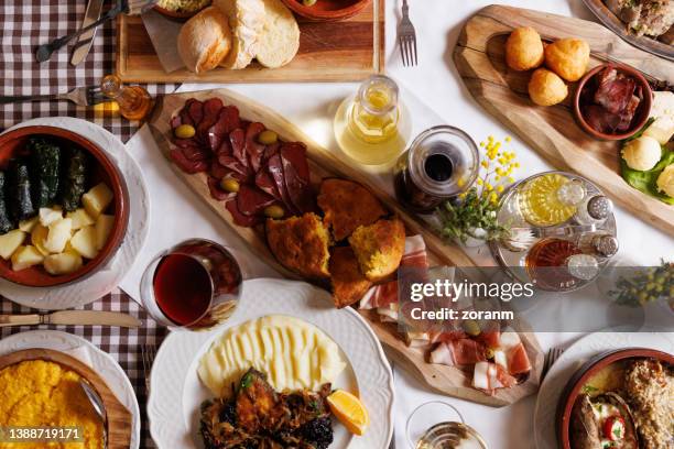 appetizer served on wooden tray on buffet in restaurant with traditional specialties - white wine overhead stock pictures, royalty-free photos & images