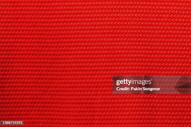 red fabric cloth polyester texture and textile background. - tejido de punto fotografías e imágenes de stock