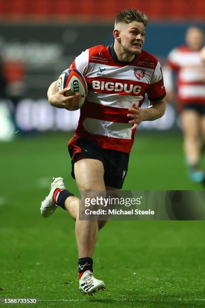 Alex Morgan of Gloucester breaks clear to score his sides fifth try during the Premiership Rugby Cup match between Bristol Bears and Gloucester Rugby...