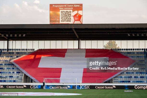 View of a giant Swiss flag in the stands before the UEFA European Under-21 Championship Qualifier between Switzerland U21 and Wales U21 at Stade de...