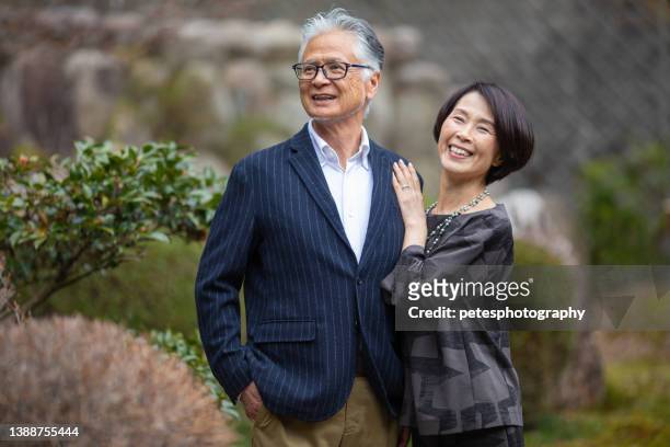 successful senior retired japanese couple - the japanese wife stock pictures, royalty-free photos & images