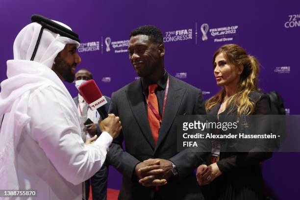Former professional footballer Clarence Seedorf talks to the media after the 72nd FIFA Congress at the Doha Exhibition and Convention Center on March...