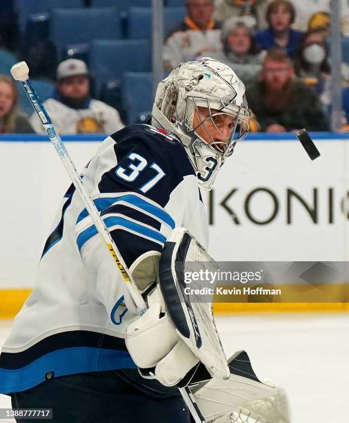 Connor Hellebuyck of the Winnipeg Jets during the game against the Buffalo Sabres at KeyBank Center on March 30, 2022 in Buffalo, New York.