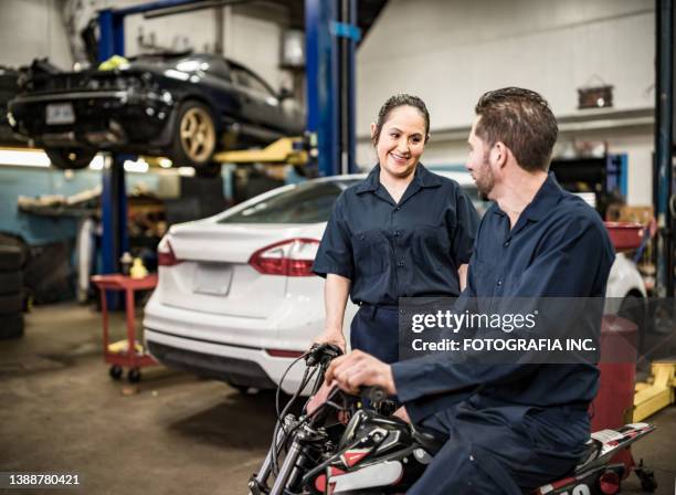 Couple (Mechanics) Photos and Premium High Res Pictures - Getty Images