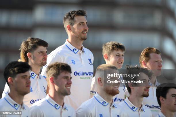 Steven Finn of Sussex towers over his team mates during a team photo during the Sussex CCC press day at The 1st Central County Ground on March 31,...