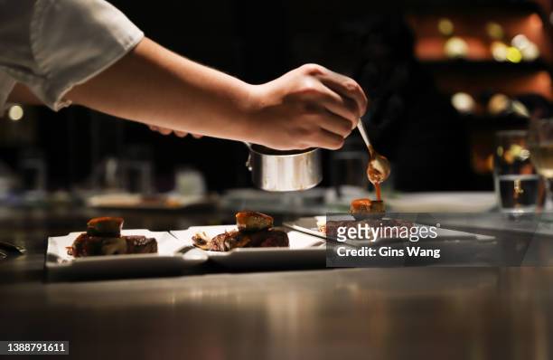 teppanyaki style. - gourmet stock pictures, royalty-free photos & images
