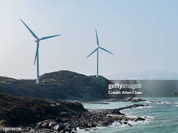 seaside scenery and windmills - guangdong province stock pictures, royalty-free photos & images