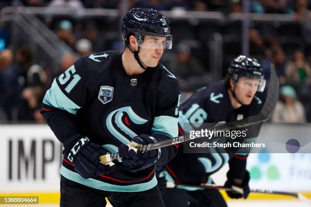 Derrick Pouliot of the Seattle Kraken prepares for a face off against the Vegas Golden Knights during the third period at Climate Pledge Arena on...