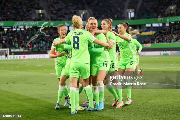 Jill Roord of VfL Wolfsburg celebrates with teammates after scoring their team's first goal during the UEFA Women's Champions League Quarter Final...