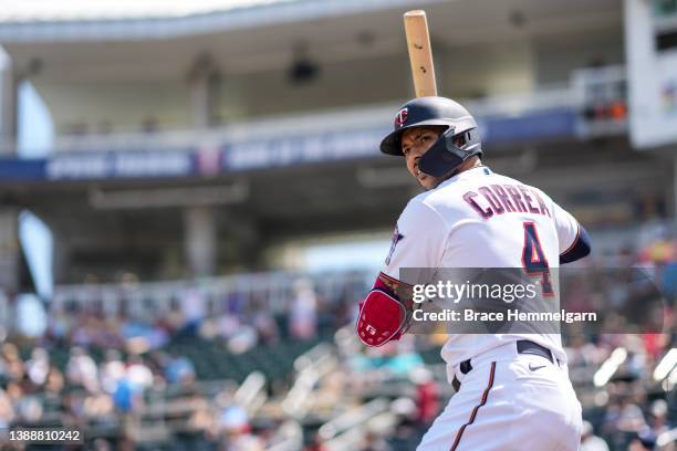 Carlos Correa of the Minnesota Twins looks on during a spring training game against the Pittsburgh Pirates on March 30, 2022 at the Hammond Stadium...