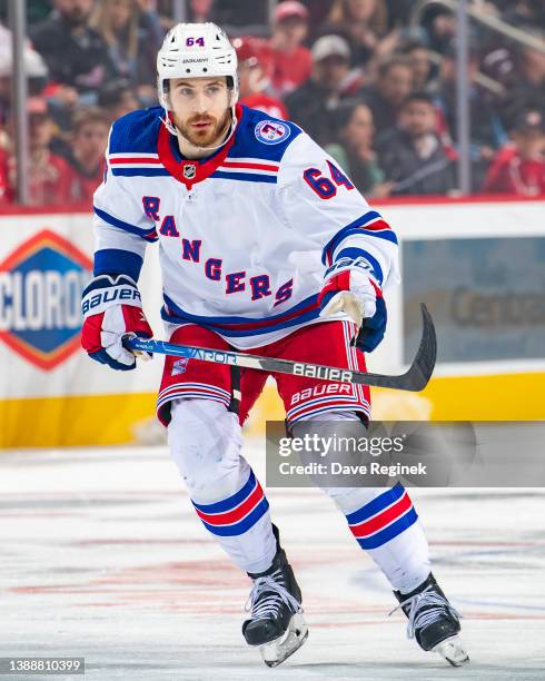 Tyler Motte of the New York Rangers skates up ice against the Detroit Red Wings during the first period of an NHL game at Little Caesars Arena on...