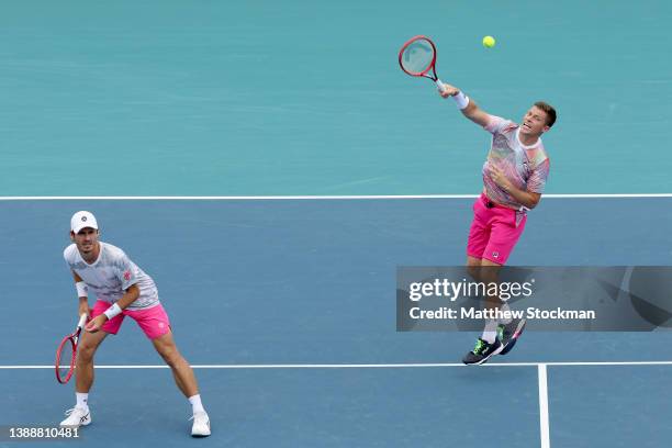 Neal Skupski of Great Britain returns ashot to Fabio Fognini and Simone Bollelli of Italy while playing with Wesley Koolhof of Netherlands during the...