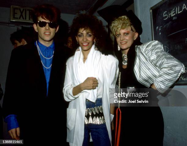 Singer and guitarist Tom Bailey and drummer Alannah Currie, of the British pop band The Thompson Twins, pose for a portrait with American...