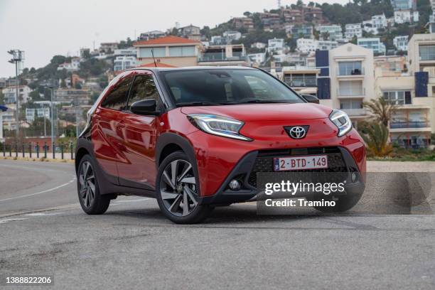 toyota aygo x on a street - toyota stock pictures, royalty-free photos & images