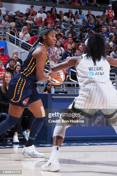 Aliyah Boston of the Indiana Fever looks to pass the ball during the game against the Chicago Sky on July 2, 2023 at Gainbridge Fieldhouse in...