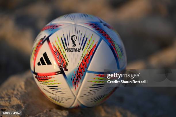 Photo illustration of a mini replica FIFA World Cup Qatar 2022 match ball ahead of the FIFA World Cup Qatar 2022 draw on March 31, 2022 in Doha,...