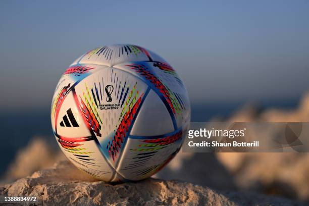 Photo illustration of a mini replica FIFA World Cup Qatar 2022 match ball ahead of the FIFA World Cup Qatar 2022 draw on March 31, 2022 in Doha,...