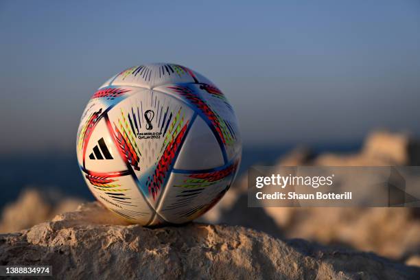 Photo illustration of a mini replica FIFA World Cup Qatar 2022 match ball ahead of the FIFA World Cup Qatar 2022 draw on March 31, 2022 in Doha,...