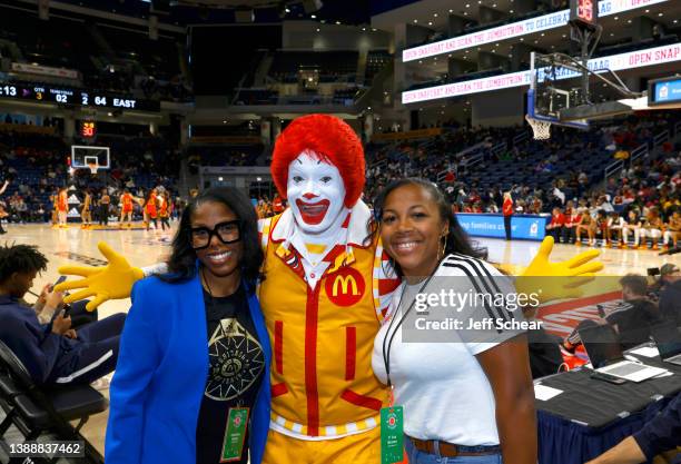Jazmine Hasty and Ti'Ara Brown pose for a photo with Ronald McDonald during the 45th Annual McDonald's All American Games at Wintrust Arena on March...