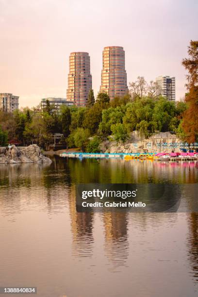 chapultepec lake and park with twin towers skyline and its reflections - bosque de chapultepec stockfoto's en -beelden